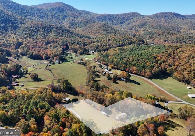 104 Bowers Cir, Blairsville, GA 30512 - aerial view of property and surrounding area featuring a forest and a mountainous background