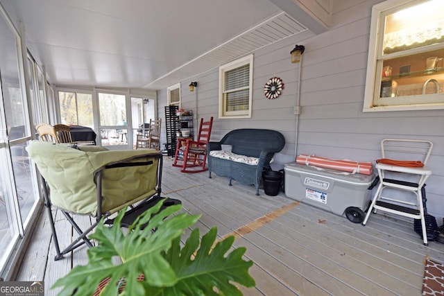 104 Bowers Cir, Blairsville, GA 30512 - sunroom / solarium featuring hardwood / wood-style flooring, wood walls, and a deck