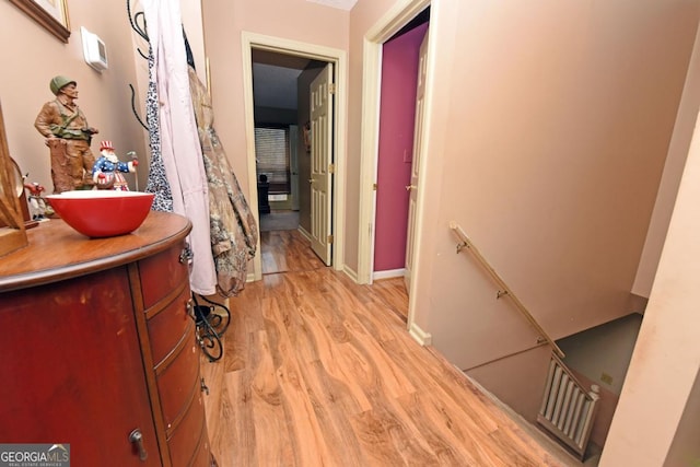 104 Bowers Cir, Blairsville, GA 30512 - hall with light wood-type flooring and an upstairs landing