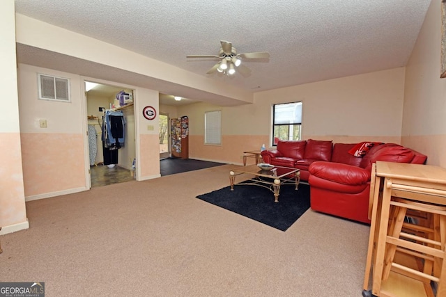 104 Bowers Cir, Blairsville, GA 30512 - living area featuring carpet, a textured ceiling, and a ceiling fan