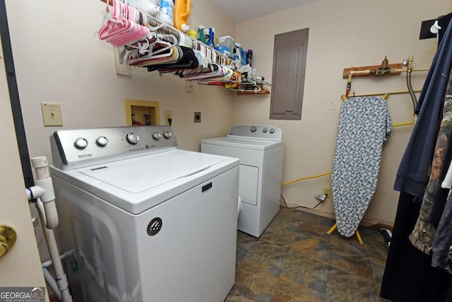 104 Bowers Cir, Blairsville, GA 30512 - laundry room featuring electric panel, washing machine and dryer, and stone finish floors