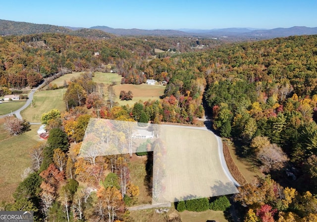 104 Bowers Cir, Blairsville, GA 30512 - aerial view of property and surrounding area featuring a heavily wooded area and a mountainous background