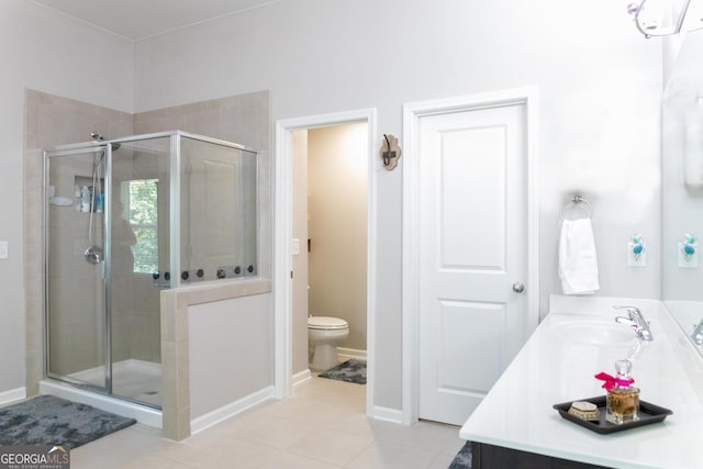 6695 Grove Meadows Ln, Cumming, GA 30028 - bathroom with vanity, a shower stall, and tile patterned floors