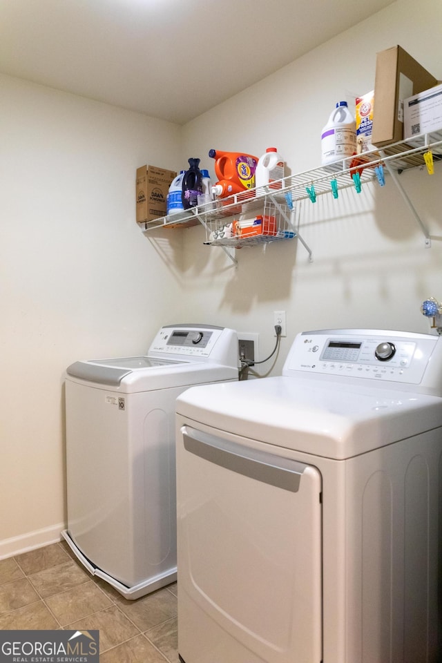 6695 Grove Meadows Ln, Cumming, GA 30028 - washroom featuring washing machine and dryer and baseboards