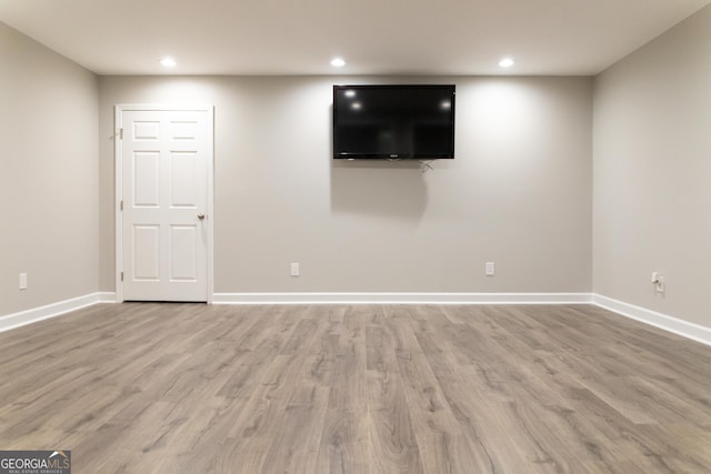 6695 Grove Meadows Ln, Cumming, GA 30028 - basement with light wood-style flooring and recessed lighting