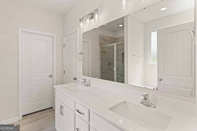 109 Wave Break Ct, Kingsland, GA 31548 - full bath with a shower stall, double vanity, recessed lighting, and wood finished floors
