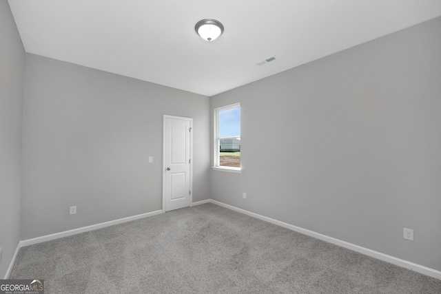 103 Gnome Ct, Perry, GA 31069 - spare room featuring carpet and baseboards