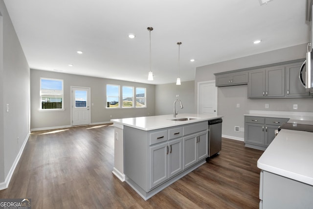103 Gnome Ct, Perry, GA 31069 - kitchen with gray cabinetry, dishwasher, dark wood-style floors, a center island with sink, and open floor plan