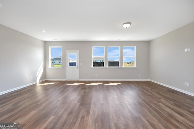 103 Gnome Ct, Perry, GA 31069 - unfurnished living room with dark wood-type flooring