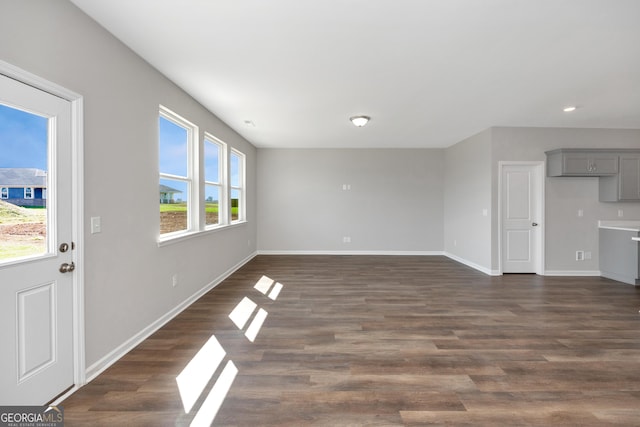 103 Gnome Ct, Perry, GA 31069 - unfurnished living room with dark wood-type flooring and recessed lighting