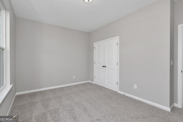 103 Gnome Ct, Perry, GA 31069 - unfurnished bedroom featuring carpet floors and baseboards