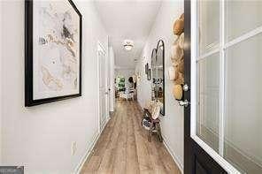 42 Buckingham Ln Unit 233, Hoschton, GA 30548 - hall with wood finished floors
