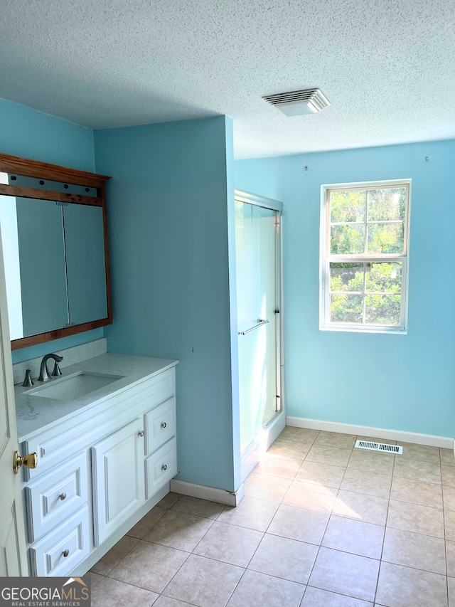 160 Buena Vista Dr, Eastanollee, GA 30538 - full bath featuring a textured ceiling, vanity, a shower stall, and tile patterned flooring
