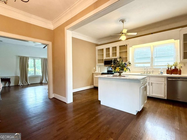 516 Longview St, Carrollton, GA 30117 - kitchen with appliances with stainless steel finishes, white cabinetry, a ceiling fan, dark wood-type flooring, and a kitchen island
