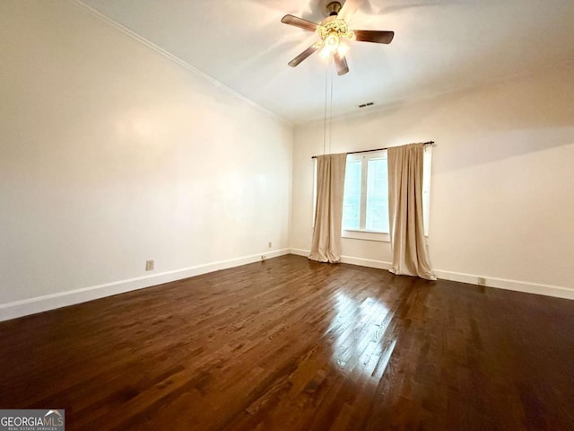 516 Longview St, Carrollton, GA 30117 - spare room featuring a ceiling fan, dark wood finished floors, and crown molding