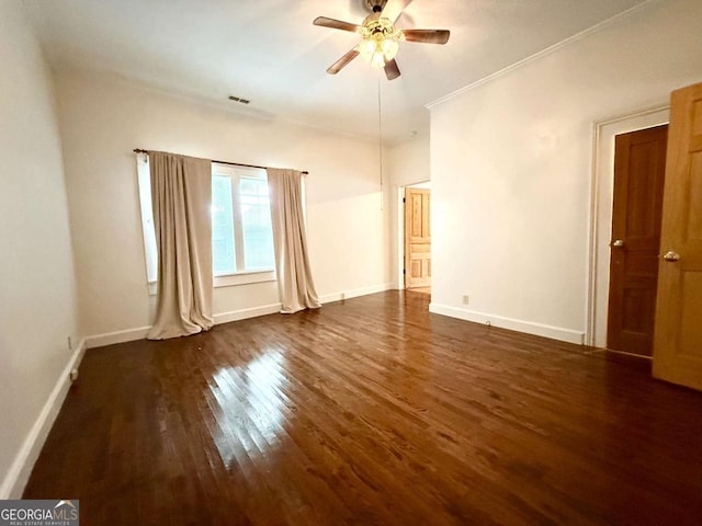 516 Longview St, Carrollton, GA 30117 - empty room featuring ceiling fan, dark wood-style floors, and crown molding