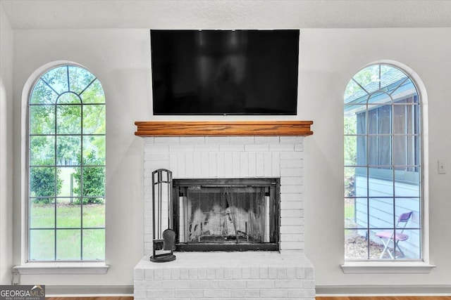 116 Overlook Bnd, Kingsland, GA 31548 - detailed view of a fireplace and wood finished floors