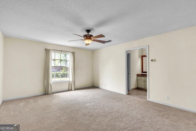 116 Overlook Bnd, Kingsland, GA 31548 - unfurnished room with light colored carpet, ceiling fan, and a textured ceiling
