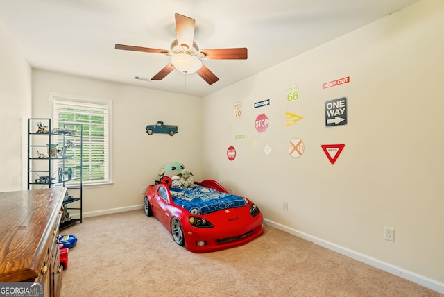 595 Mcgarity Dr, Mcdonough, GA 30252 - carpeted bedroom featuring baseboards and ceiling fan