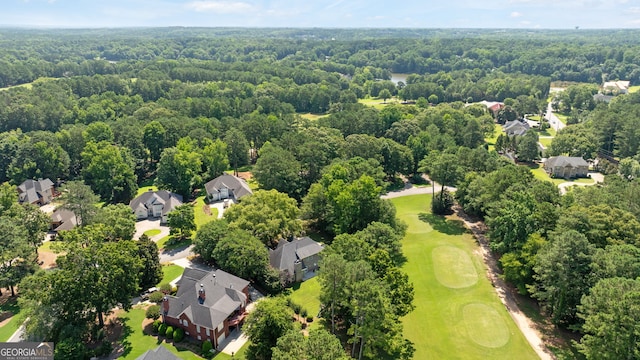 595 Mcgarity Dr, Mcdonough, GA 30252 - aerial view of residential area featuring a local golf course and a heavily wooded area