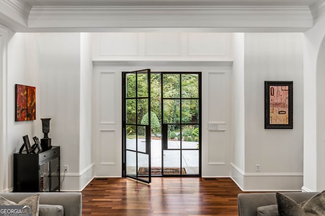 3401 Stillhouse Rd SE, Atlanta, GA 30339 - doorway with dark wood-type flooring and crown molding