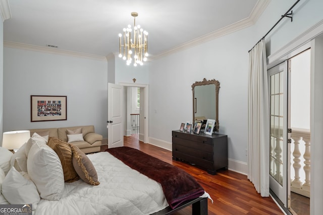 3401 Stillhouse Rd SE, Atlanta, GA 30339 - bedroom featuring crown molding, dark wood-style flooring, and a chandelier