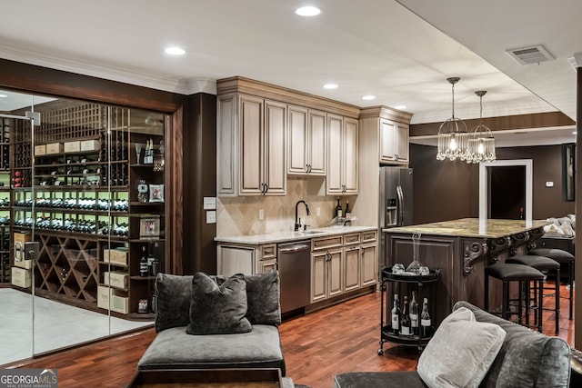 3401 Stillhouse Rd SE, Atlanta, GA 30339 - indoor bar featuring stainless steel appliances, crown molding, pendant lighting, a chandelier, and tasteful backsplash