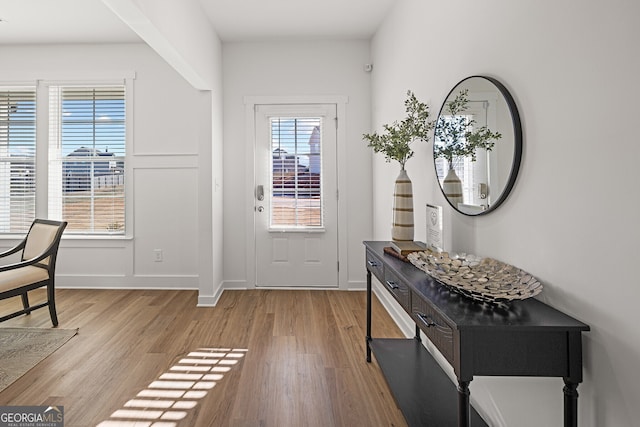 1313 Pj E Rd, Covington, GA 30014 - entryway with light wood-style flooring and baseboards