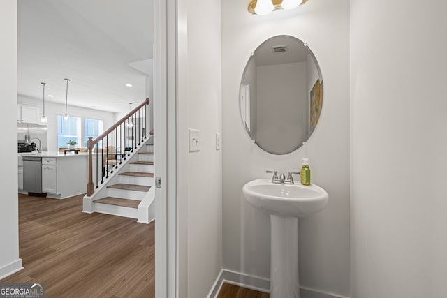 1313 Pj E Rd, Covington, GA 30014 - bathroom featuring wood finished floors and recessed lighting