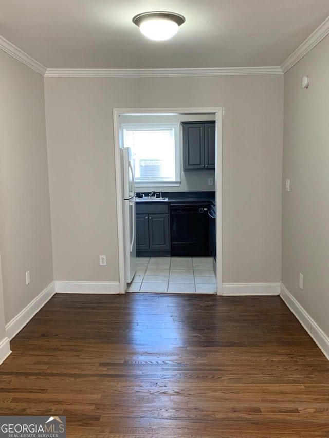 2367 Cascade Rd SW Unit B7, Atlanta, GA 30311 - unfurnished room with crown molding and light wood-style flooring