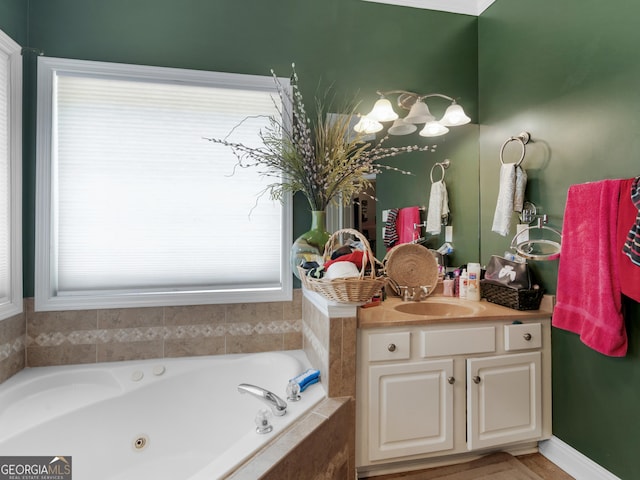 141 Wexford Ct, Stockbridge, GA 30281 - full bath featuring vanity and a jetted tub