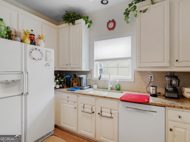 141 Wexford Ct, Stockbridge, GA 30281 - kitchen featuring white appliances, decorative backsplash, and white cabinetry