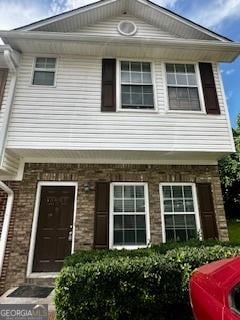 3609 Ginnis Rd SW Unit 6, Atlanta, GA 30331 - view of exterior entry featuring brick siding