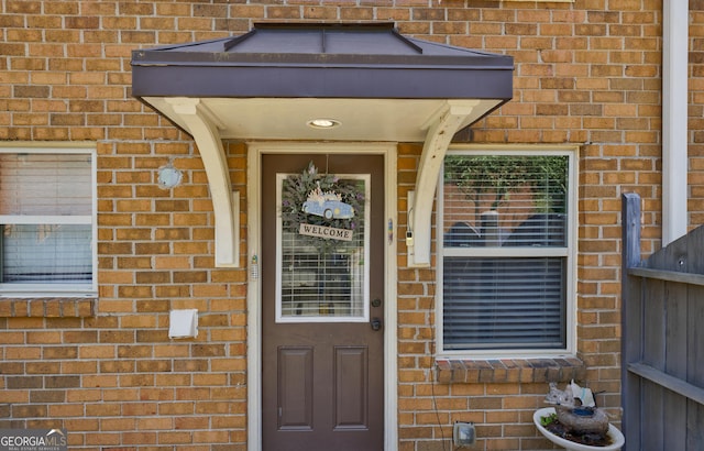 105 N River Dr Unit G, Sandy Springs, GA 30350 - doorway to property featuring brick siding