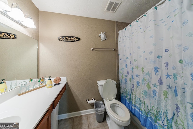 105 N River Dr Unit G, Sandy Springs, GA 30350 - bathroom with vanity, tile patterned flooring, a textured wall, and curtained shower