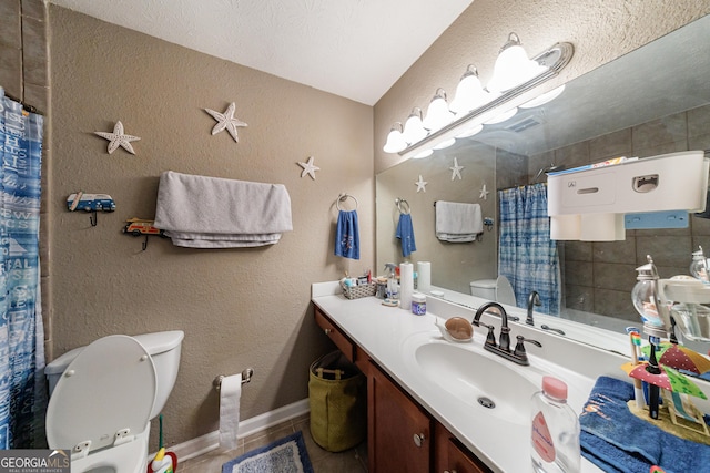 105 N River Dr Unit G, Sandy Springs, GA 30350 - full bathroom featuring vanity, tile patterned floors, a shower with curtain, and a textured wall