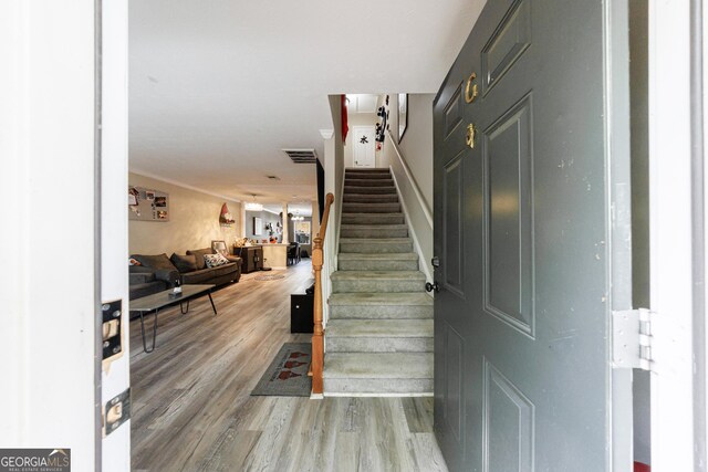 105 N River Dr Unit G, Sandy Springs, GA 30350 - staircase with wood finished floors