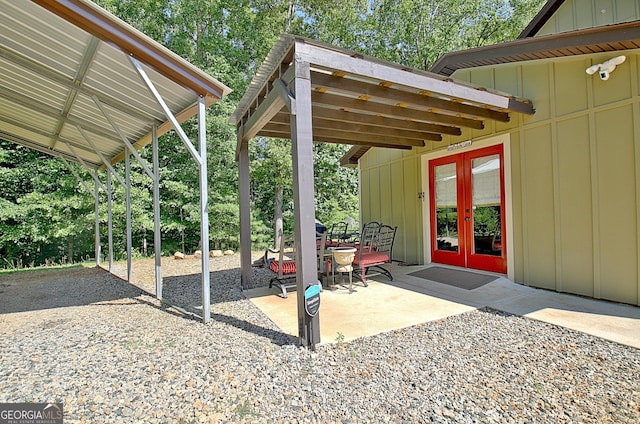 460 Morgan Mill Rd, Brooks, GA 30205 - view of patio / terrace with french doors and view of wooded area