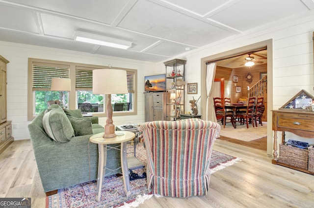 460 Morgan Mill Rd, Brooks, GA 30205 - living area featuring wooden walls, wood finished floors, and a ceiling fan