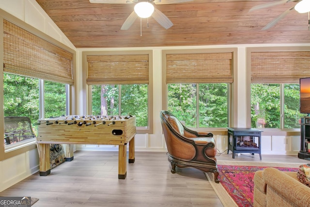 460 Morgan Mill Rd, Brooks, GA 30205 - game room with ceiling fan, wooden ceiling, a wood stove, wood finished floors, and lofted ceiling
