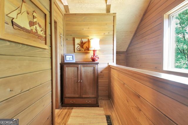 460 Morgan Mill Rd, Brooks, GA 30205 - corridor featuring wooden walls and light wood-style flooring
