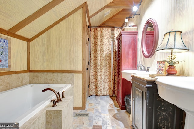 460 Morgan Mill Rd, Brooks, GA 30205 - full bath featuring a garden tub, stone finish floors, vanity, and curtained shower