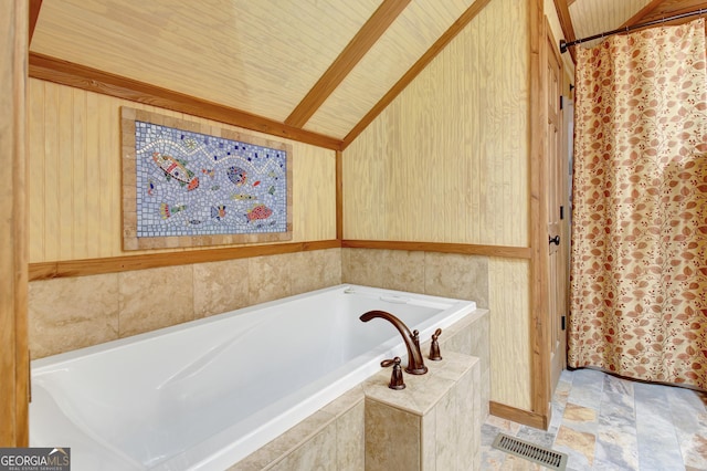 460 Morgan Mill Rd, Brooks, GA 30205 - full bathroom featuring a bath, a shower with shower curtain, and lofted ceiling