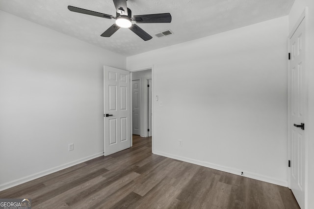 2800 Vultee Dr, Columbus, GA 31909 - unfurnished bedroom with wood finished floors, ceiling fan, and a textured ceiling