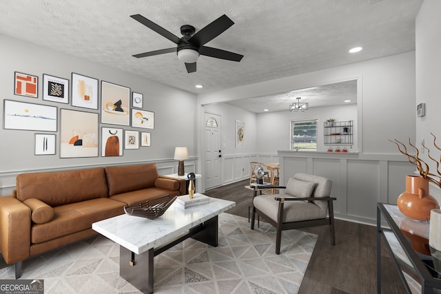 2800 Vultee Dr, Columbus, GA 31909 - living room with light wood-style floors, recessed lighting, a ceiling fan, a textured ceiling, and a wainscoted wall