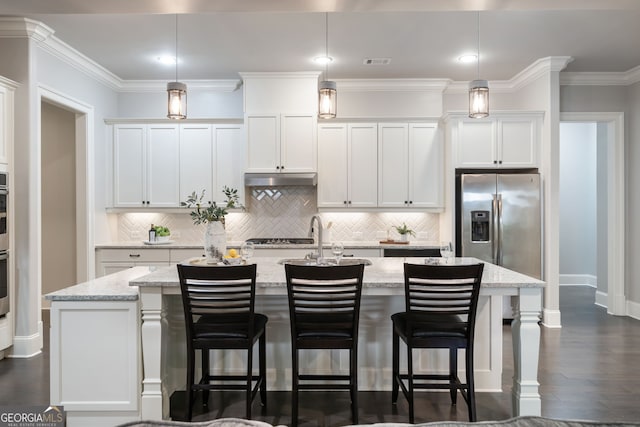 10580 Grandview Sq, Johns Creek, GA 30097 - kitchen featuring stainless steel fridge with ice dispenser, a kitchen island with sink, white cabinetry, dark wood-style floors, and ornamental molding