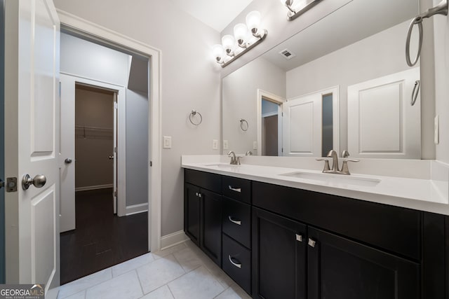 10580 Grandview Sq, Johns Creek, GA 30097 - bathroom featuring double vanity, tile patterned flooring, and a spacious closet
