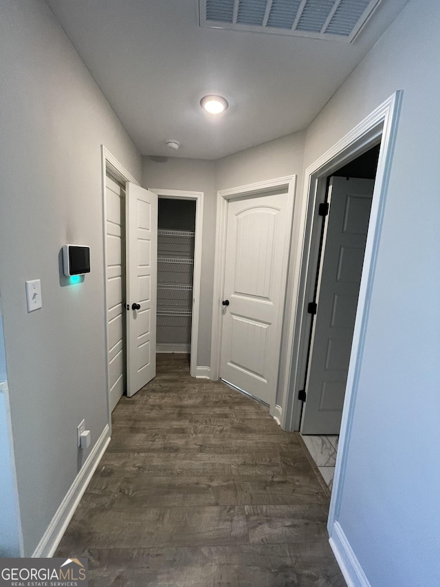 113 Sourwood Ln, Warner Robins, GA 31093 - corridor with wood finished floors and baseboards