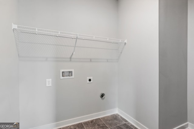 4601 Blacksmith Ln, Jefferson, GA 30549 - laundry area featuring hookup for an electric dryer, hookup for a washing machine, and dark tile patterned floors
