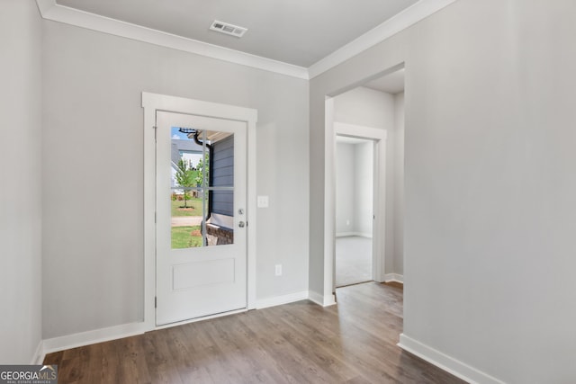 4601 Blacksmith Ln, Jefferson, GA 30549 - entryway with crown molding and wood finished floors